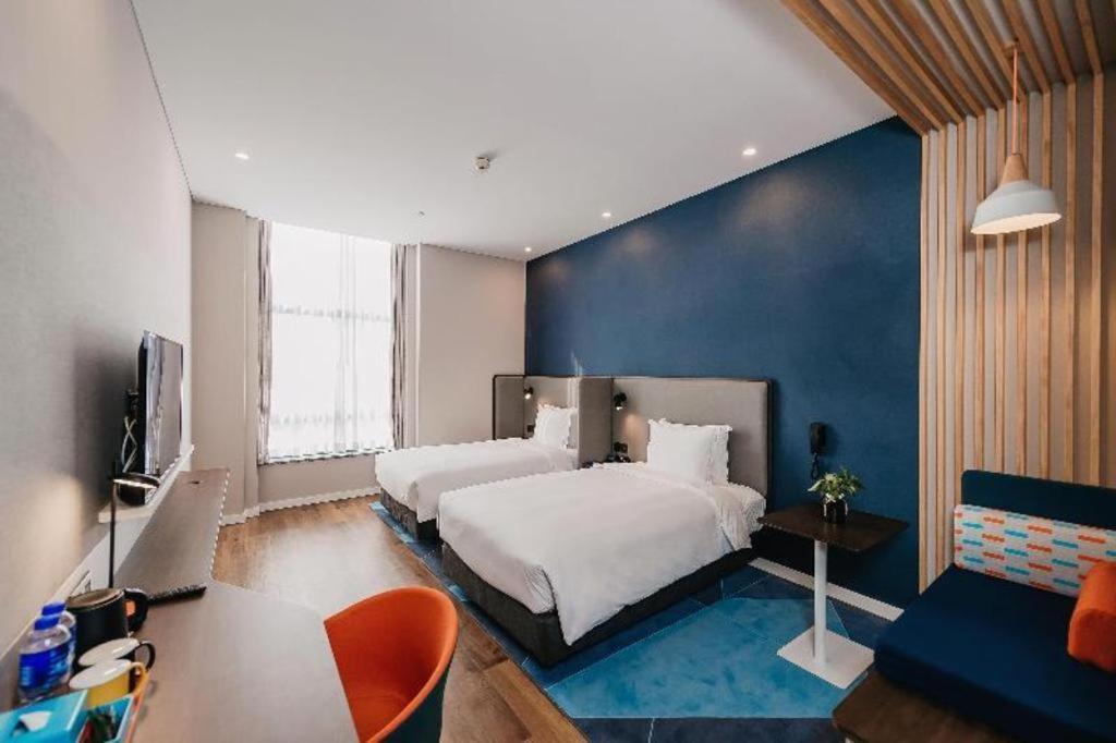 Holiday Inn Taizhou Cmc Esterno foto